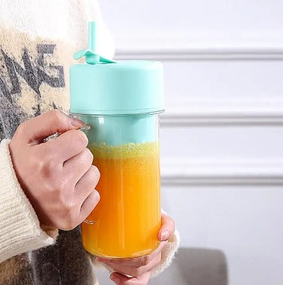 Exprimidor Eléctrico Portátil con Botella Transparente